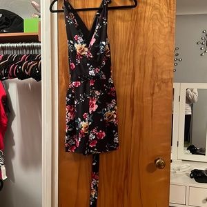 Black floral v-neck express romper NWT